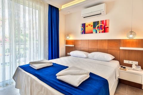 Economy Double Room, 1 Double Bed, City View | Minibar, in-room safe, soundproofing, rollaway beds