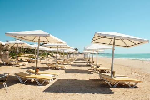 Private beach, sun loungers, beach umbrellas, beach towels