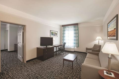 Deluxe Suite, 1 King Bed | Premium bedding, desk, laptop workspace, blackout drapes