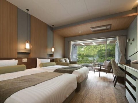 Hotaka Deluxe Twin room | Down comforters, minibar, laptop workspace, free WiFi