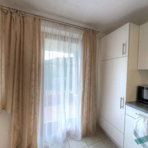 Apartment, 2 Bedrooms | Private kitchen | Full-size fridge, microwave, oven, stovetop