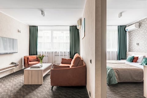 Deluxe Double Room, 1 Bedroom | 1 bedroom, in-room safe, desk, blackout drapes