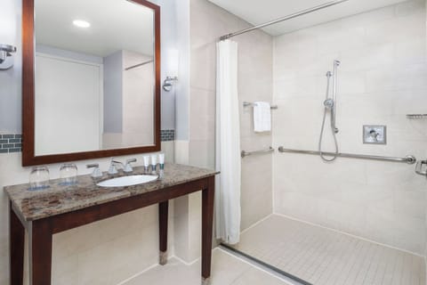 Combined shower/tub, designer toiletries, hair dryer, bathrobes