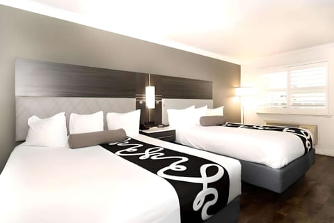 Premium bedding, blackout drapes, iron/ironing board