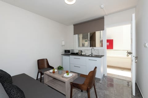 Deluxe Apartment, 1 Bedroom, Balcony, City View | Private kitchen | Fridge, electric kettle, cookware/dishes/utensils