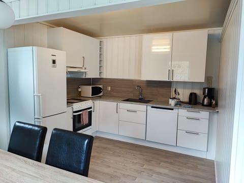 Apartment 4 Fjord View, 3 bedrooms | Private kitchen | Fridge, microwave, coffee/tea maker, electric kettle