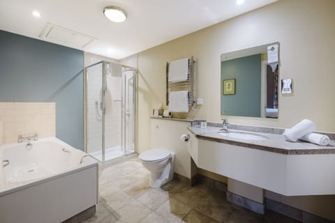 Superior Double Room | Bathroom | Combined shower/tub, deep soaking tub, designer toiletries, hair dryer