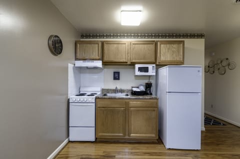 Suite, 1 Bedroom | Private kitchen | Full-size fridge, microwave, oven, stovetop