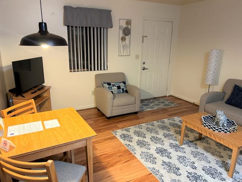 Suite, 1 Bedroom | Living area | Flat-screen TV, DVD player