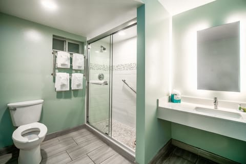 Oceanfront King Kitchenette | Bathroom | Eco-friendly toiletries, hair dryer, towels