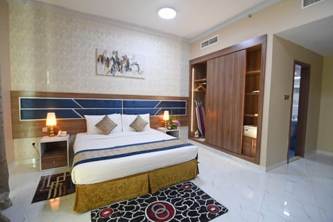 Deluxe Double Room | In-room safe, desk, laptop workspace, blackout drapes