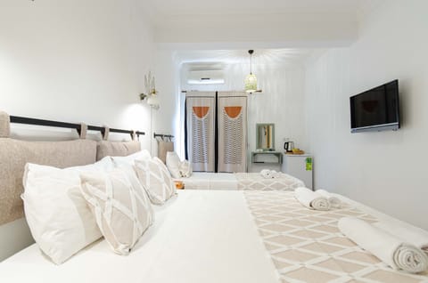 Superior Triple Room, Garden View | Premium bedding, minibar, soundproofing, free WiFi