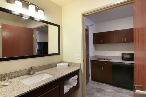 Suite, 1 King Bed with Sleeper Sofa, Non Smoking | Bathroom | Free toiletries, hair dryer, towels, soap