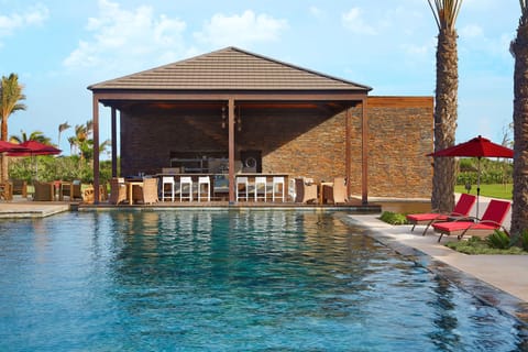 2 outdoor pools, open 8:00 AM to 7:00 PM, pool umbrellas, sun loungers