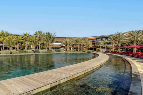 2 outdoor pools, open 8:00 AM to 7:00 PM, pool umbrellas, sun loungers