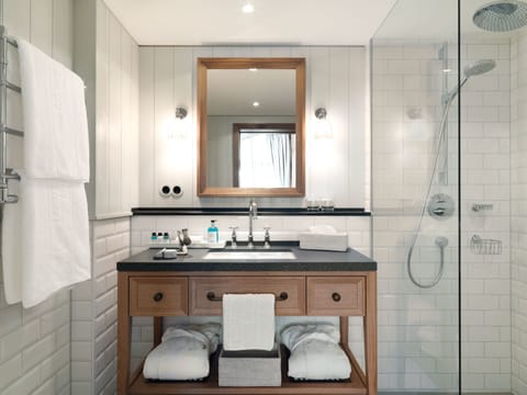 Hair dryer, bathrobes, slippers, towels