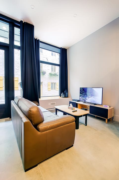 Loft, 1 Bedroom, Ground Floor (C101) | Living room | Flat-screen TV, DVD player