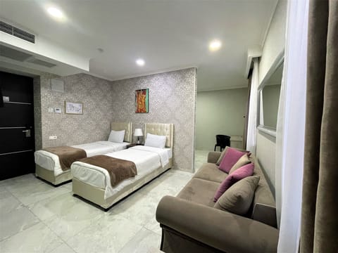 Family Room, 2 Bedrooms | Hypo-allergenic bedding, minibar, in-room safe, desk