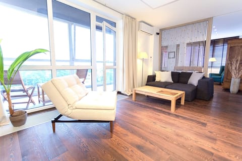 Apartment, Accessible, City View | Living area | Flat-screen TV