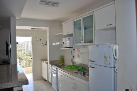 Apartment, 2 Bedrooms | Private kitchen | Fridge, microwave, stovetop, cookware/dishes/utensils