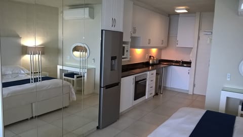 414 Luxury Studio Apartment | Private kitchen | Full-size fridge, microwave, oven, stovetop
