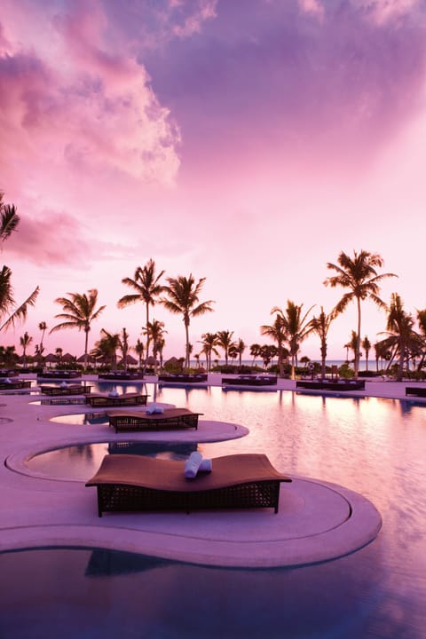 2 outdoor pools, cabanas (surcharge), pool umbrellas