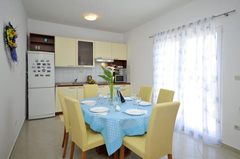 Family Apartment, 1 Bedroom, Sea View, Sea Facing | Private kitchen | Fridge, microwave, stovetop, coffee/tea maker