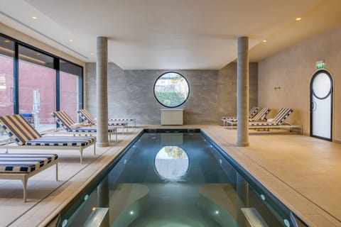 Indoor pool, seasonal outdoor pool, pool umbrellas, sun loungers