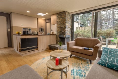 Deluxe Cottage, 1 Bedroom (VIP) | Living area | 80-cm TV with cable channels