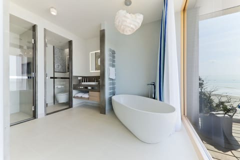 Suite, Sea View | Bathroom amenities | Rainfall showerhead, free toiletries, hair dryer, bathrobes