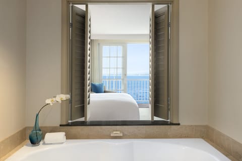 Suite, 1 Bedroom, Oceanfront | Bathroom | Separate tub and shower, designer toiletries, hair dryer, bathrobes