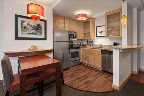 Suite, 2 Bedrooms | Private kitchen | Fridge, microwave, stovetop, dishwasher