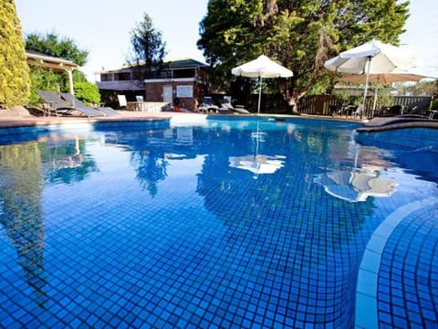 Outdoor pool, open 7:30 AM to 9:00 PM, pool umbrellas, sun loungers