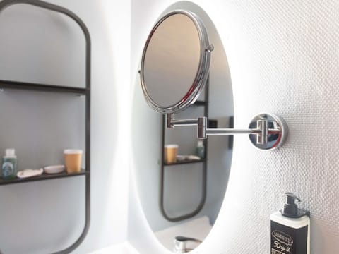 Shower, eco-friendly toiletries, hair dryer, towels