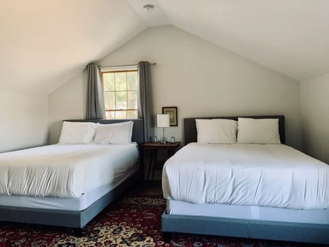 Historic Inn Two Bedroom Suite NOTL | Premium bedding, individually decorated, desk, blackout drapes