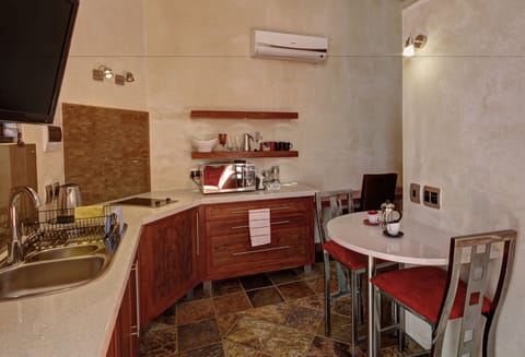 Standard Apartment, 1 Bedroom | Private kitchen | Fridge, microwave, stovetop, coffee/tea maker