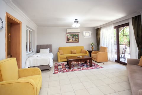 Family Apartment, 1 Bedroom, Pool View | Premium bedding, minibar, desk, laptop workspace