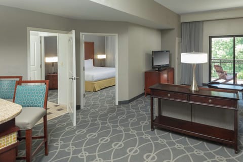 Premium Suite, 1 King Bed, Non Smoking, Balcony | Living area | Flat-screen TV, video-game console, iPod dock, pay movies
