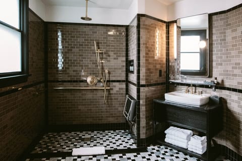Deluxe Room, 1 Queen Bed, City View | Bathroom | Shower, rainfall showerhead, designer toiletries, hair dryer