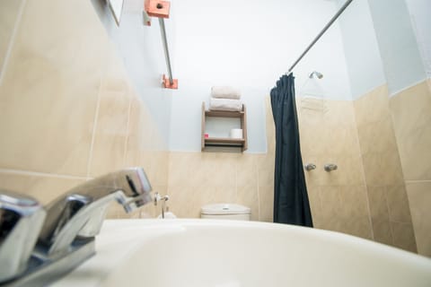 Queen Room | Bathroom | Shower, free toiletries, towels, soap