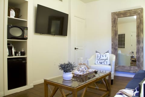 Junior Suite | Living area | 42-inch flat-screen TV with cable channels, TV, fireplace