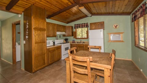 Cabin | Private kitchen | Full-size fridge, microwave, coffee/tea maker