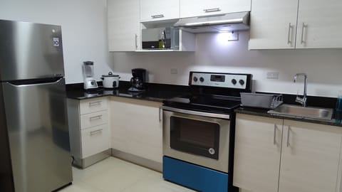 Comfort Studio, 3 Bedrooms, Kitchen, Partial Sea View | Private kitchen | Full-size fridge, microwave, oven, stovetop