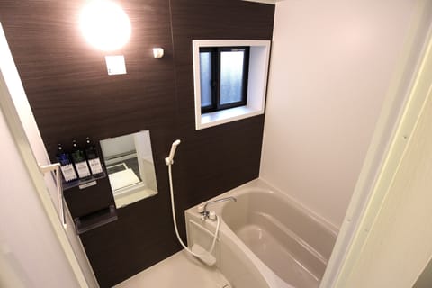 Studio, 3 Beds | Bathroom | Separate tub and shower, deep soaking tub, free toiletries, hair dryer