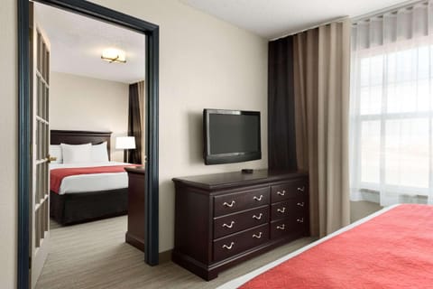 Suite, Multiple Beds, Non Smoking | Premium bedding, desk, blackout drapes, iron/ironing board
