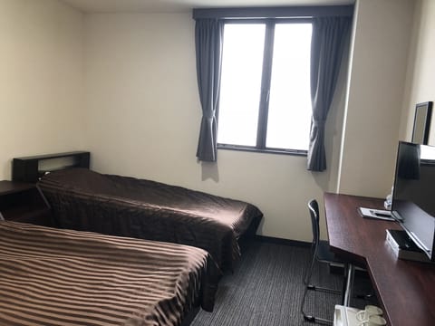 Twin Room, Non Smoking | Free WiFi, bed sheets