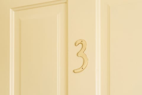 Apartment number 3 at he top of the stairs.