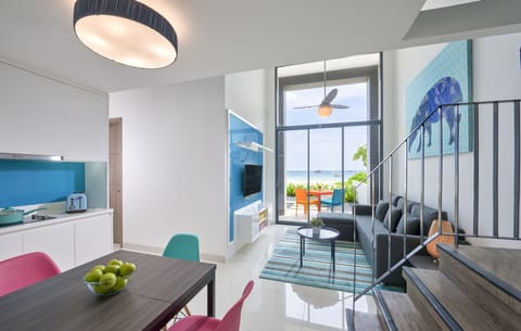 Two-Bedroom Ocean Loft | Living area | 40-inch LED TV with cable channels, TV