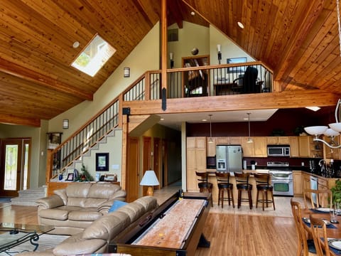 Open plan living area leading to upstairs primary suite