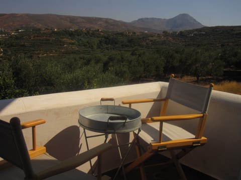 Relax and have a drink on the balcony from the Moroccan Room